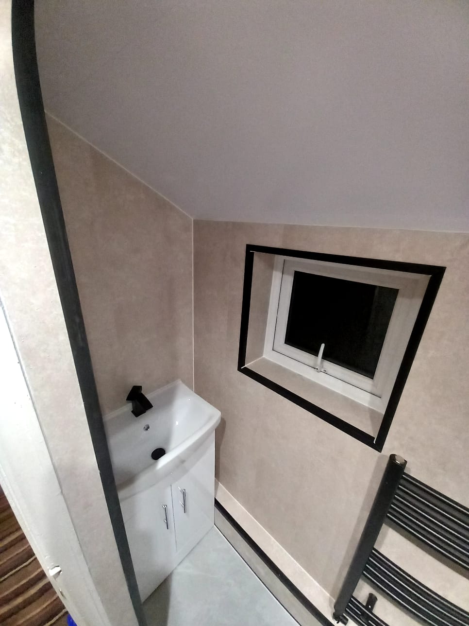 Finished bathroom using Concrete Beige panels