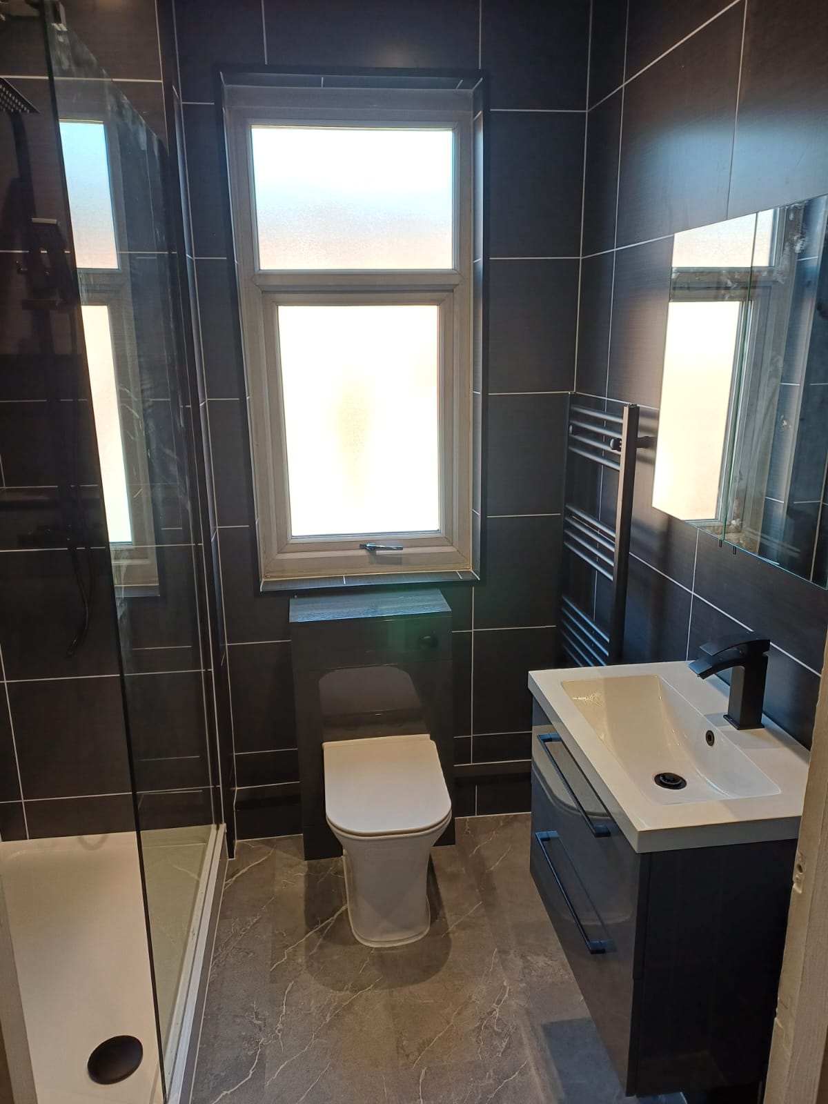 Finished bathroom using Dark Grey Ice Matt panels