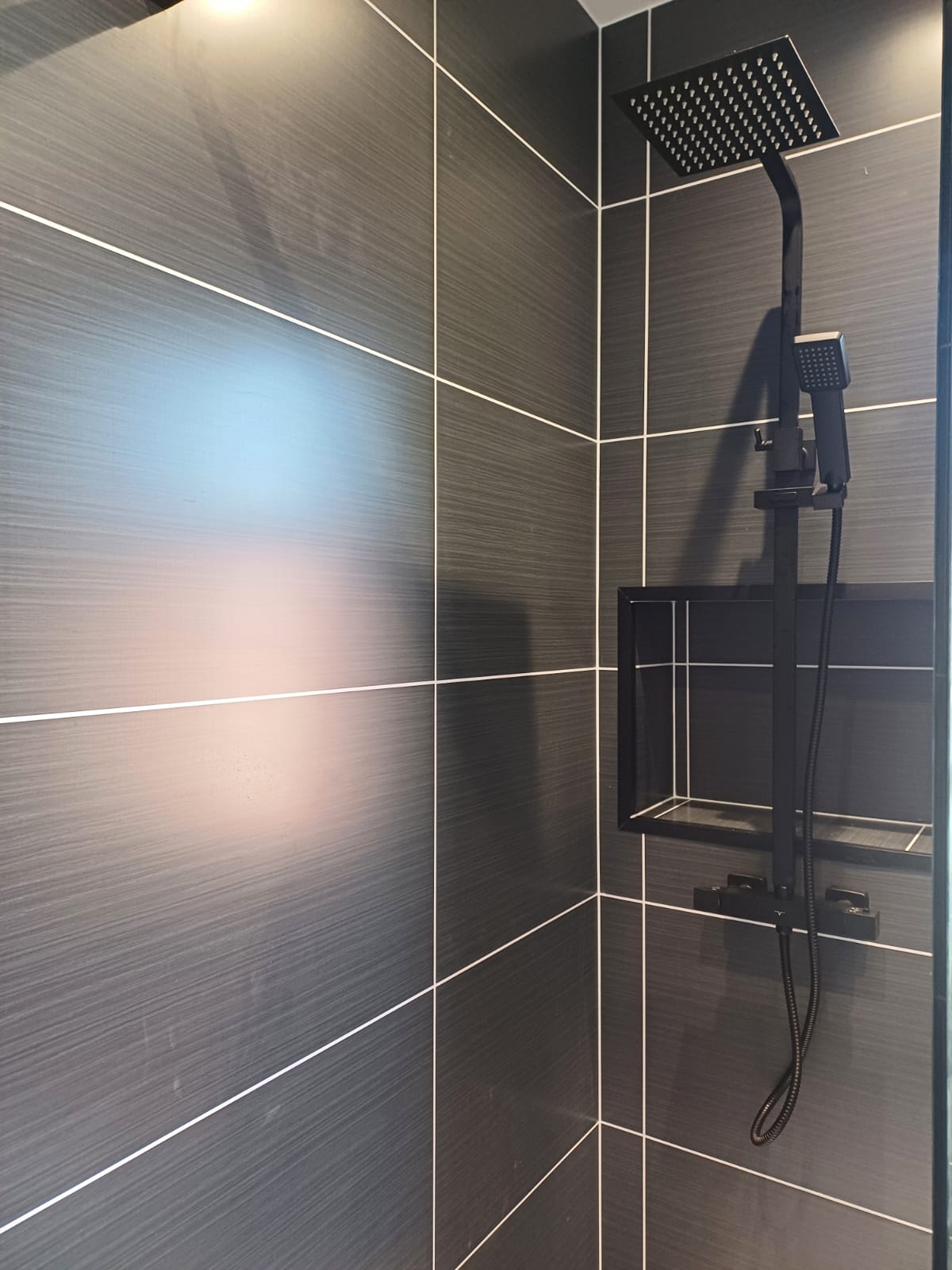 Finished bathroom using Dark Grey Ice Matt panels