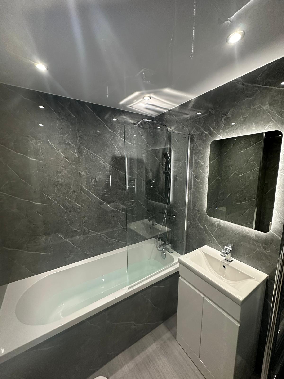 Finished bathroom using Dark Grey Marble Gloss panels