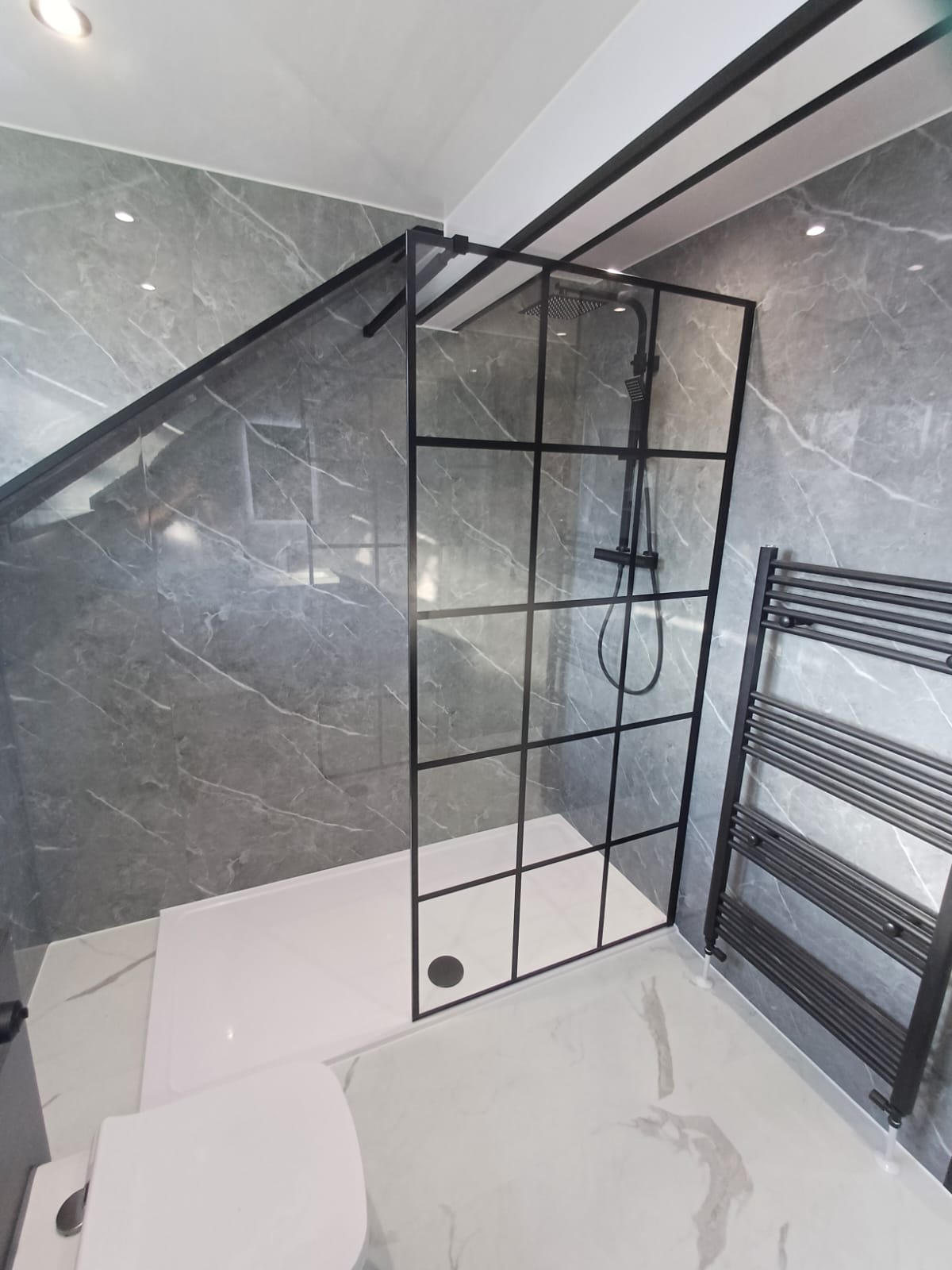 Finished bathroom using Dark Grey Marble Gloss panels