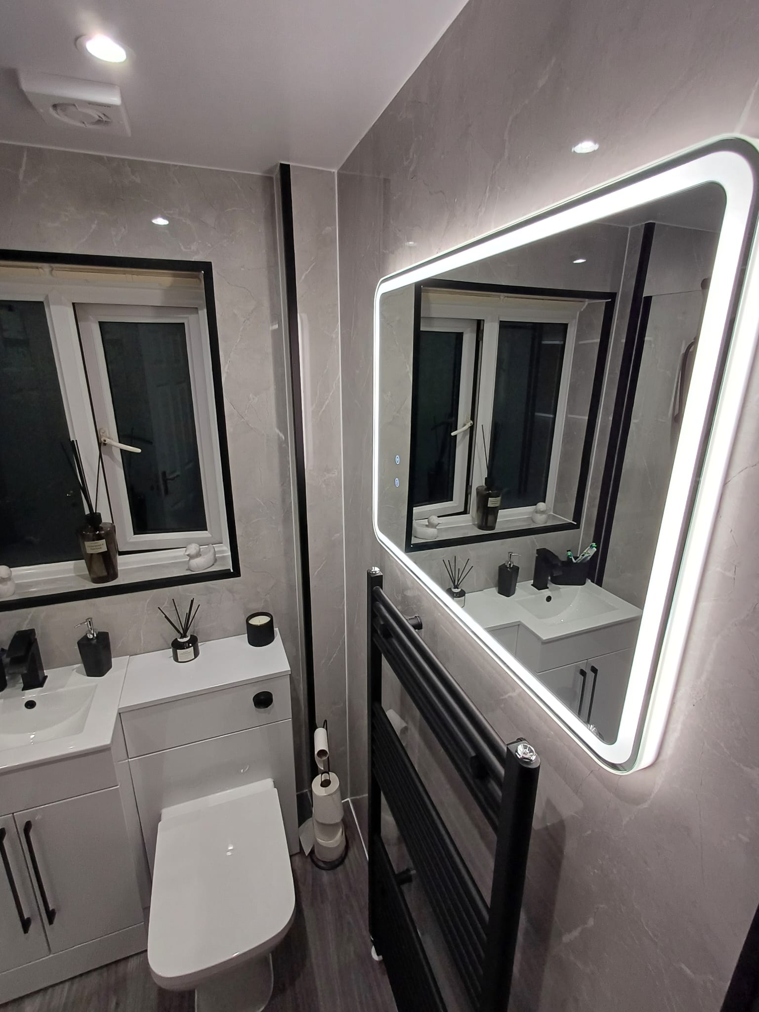Finished bathroom using Gloss Marble panels