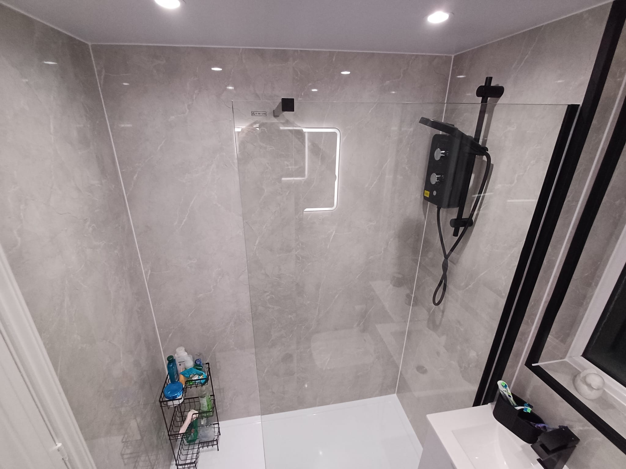 Finished bathroom using Gloss Marble panels