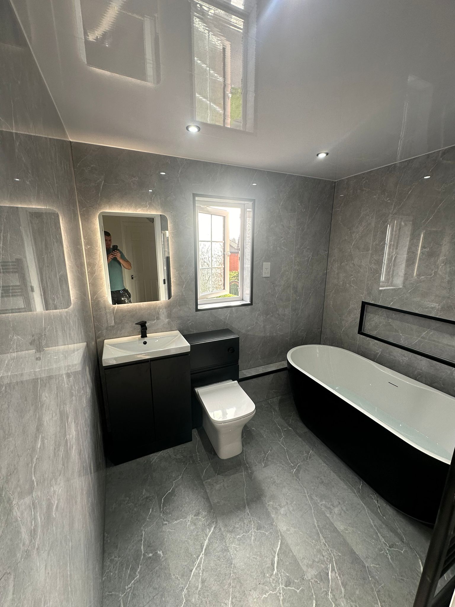 Finished bathroom using Gloss Marble panels