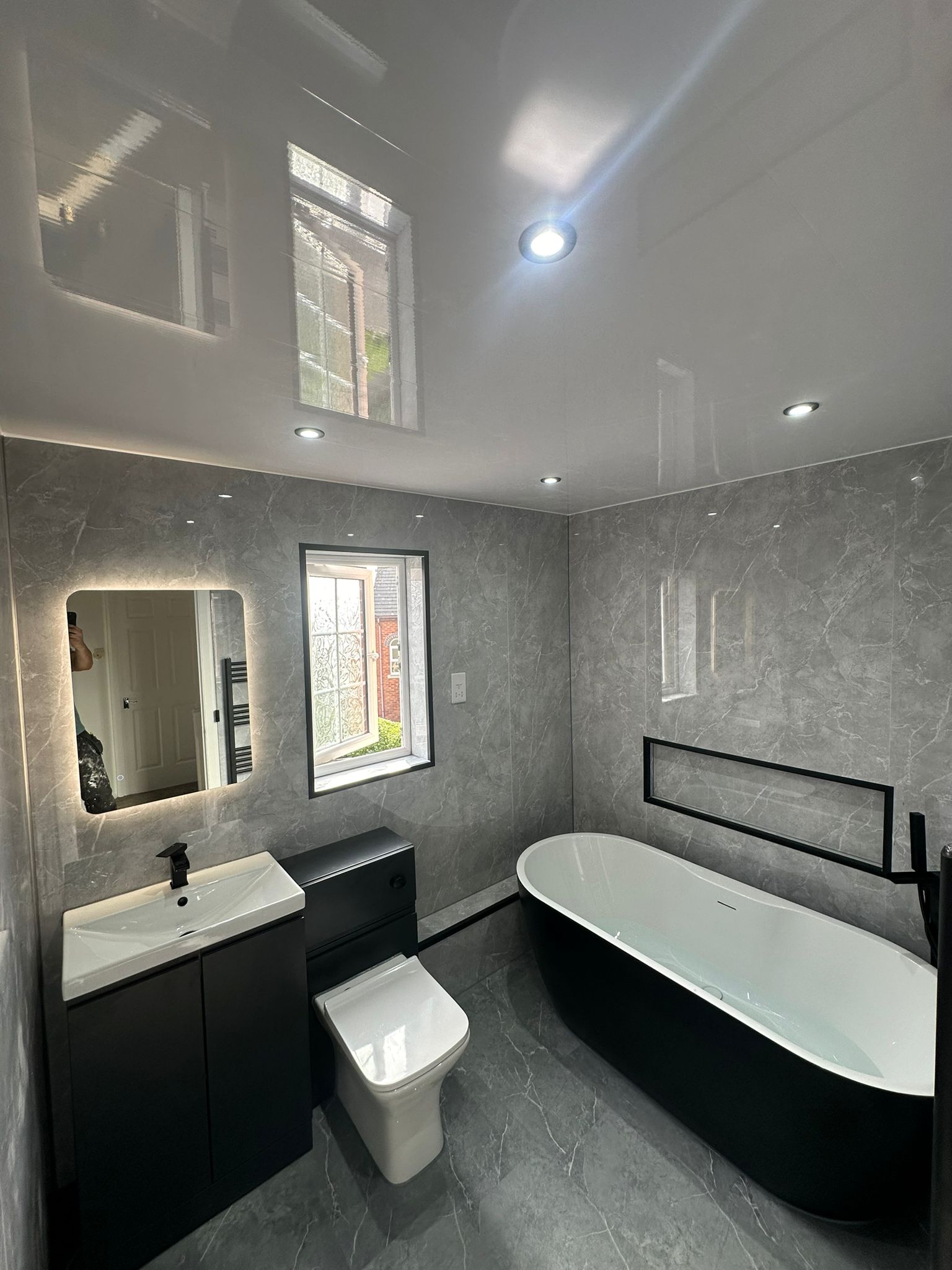 Finished bathroom using Gloss Marble panels