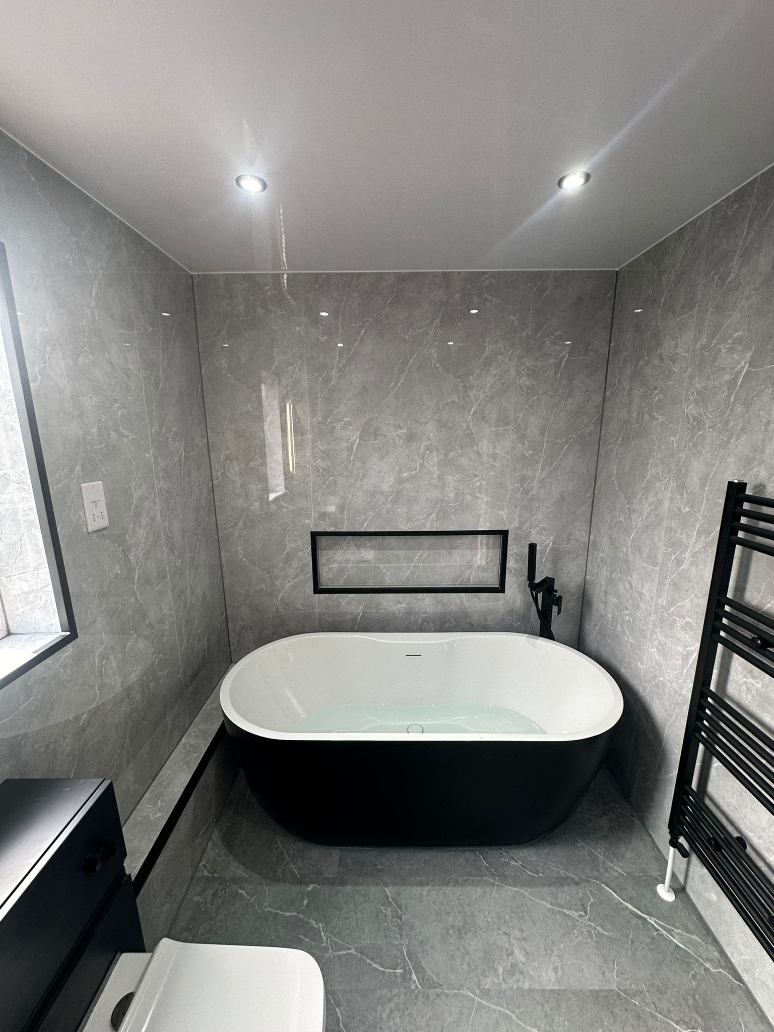 Finished bathroom using Gloss Marble panels