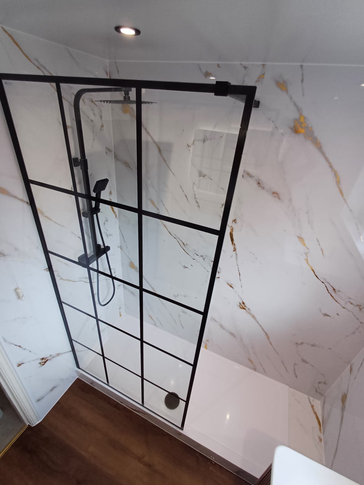 Finished bathroom using Gold Marble panels