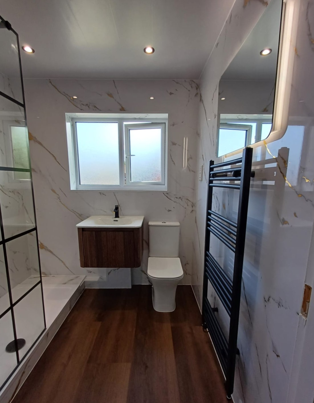 Finished bathroom using Gold Marble panels