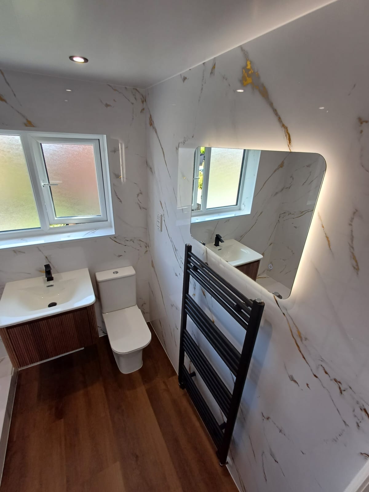 Finished bathroom using Gold Marble panels