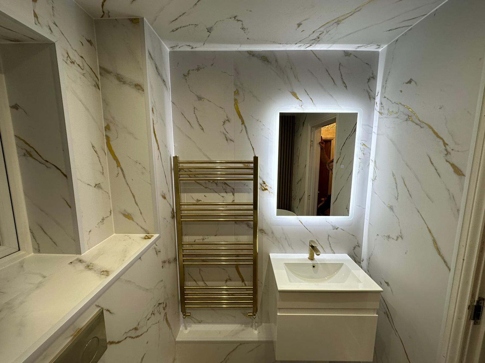Finished bathroom using Gold Marble panels
