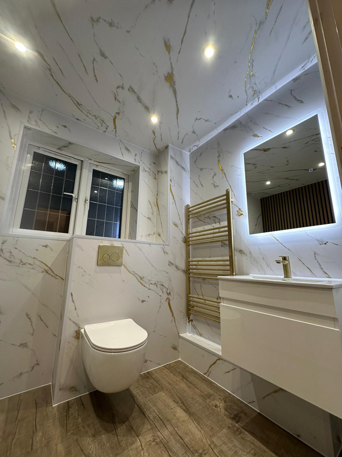 Finished bathroom using Gold Marble panels